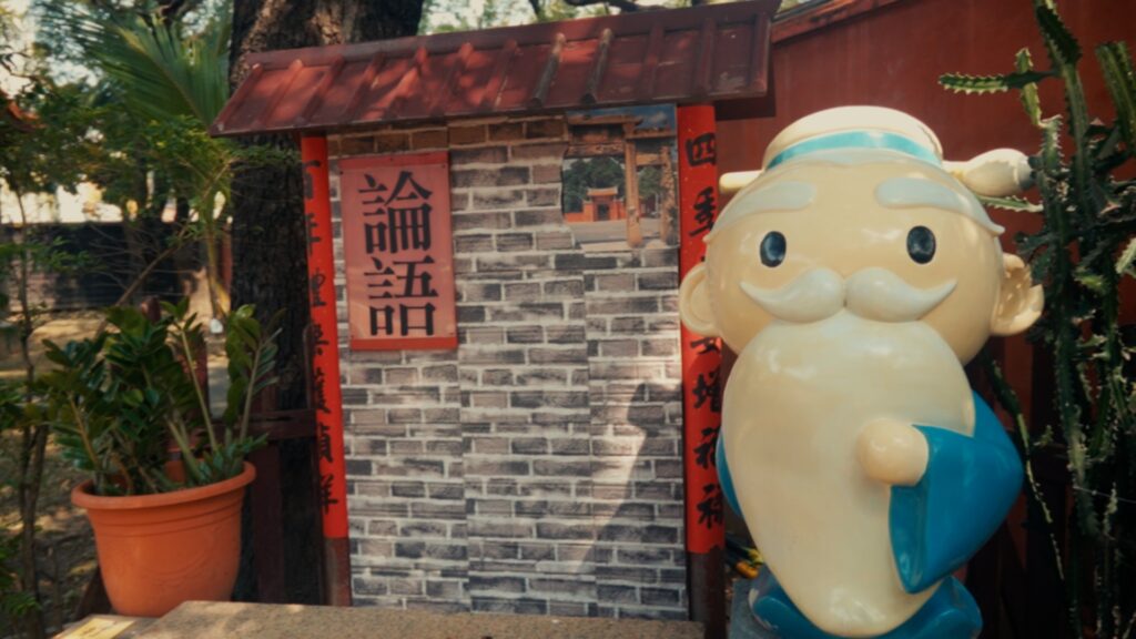 Adorable cartoon-style Confucius statue at Tainan Confucius Temple